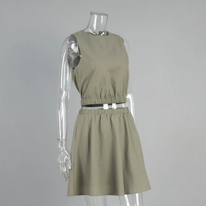 Detailed texture of olive green cotton linen set featuring elastic pleated waist and hem