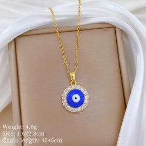 Detailed view of evil eye necklace with blue zircons and dimensions on silk background