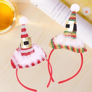 Detail of red and gold striped mini Santa hat headbands with white plush trim and buckle