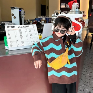 Kids yellow nylon chest bag paired with a retro wave pattern knit sweater for travel