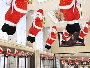 Décorations de Noël Père Noël en peluche de tailles variées pour vitrines de magasin