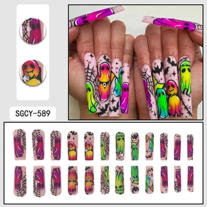 Halloween coffin press-on nails with neon ghost and bat graffiti art and rhinestones