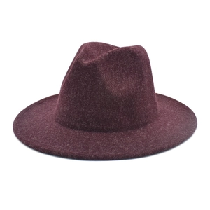 Close-up of deep purple wool felt fedora showing premium texture and wide brim