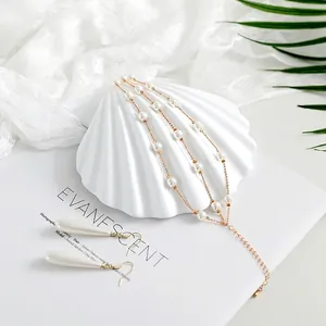 White shell-shaped jewelry display stand for earrings and necklaces photography