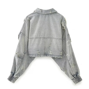 Women's cropped grey denim jacket with distressed ripped details and elastic cuffs