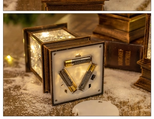 Detail view of the vintage lantern bottom showing the battery compartment with AA batteries