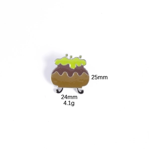 Detail of cauldron enamel pin with dimensions 25mm by 24mm and weight 4.1g