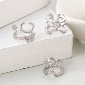 Elegant silver open knuckle rings set with sparkling pavé cubic zirconia for women