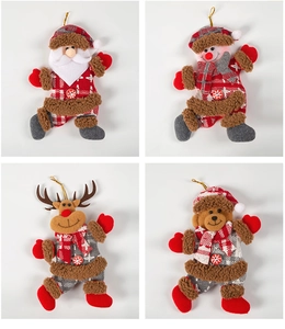 Close-up of four plush Christmas ornaments featuring Santa, snowman, elk, and bear with gold cords