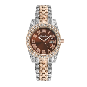 Close-up of luxury brown dial watch with diamond markers and date display window