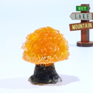 Natural orange crystal stone tree ornament on resin base for home and office desk decor