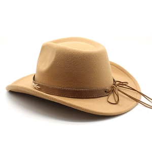 Detail of camel wool fedora hat featuring brown leather band and white stitching accents