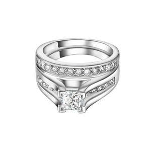 Detail of silver alloy wedding ring set with princess cut zircon and side stones