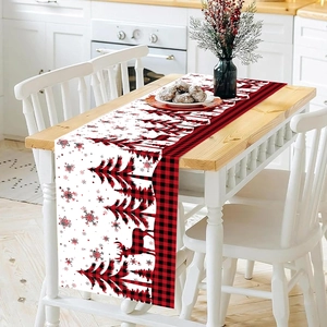 Christmas table runner with red and black buffalo plaid, reindeer and tree silhouettes