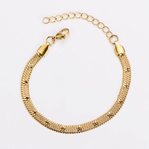 Detail of gold snake bone chain showing textured herringbone weave and lobster clasp