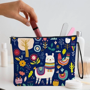 Navy blue alpaca print makeup bag with zipper and handle for travel cosmetics storage