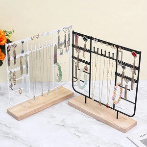 Iron jewelry display stand with wooden base for organizing earrings and necklaces