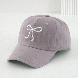 Dusty purple cotton baseball cap featuring delicate white embroidered bow on the front