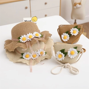 Kids woven straw sun hat and matching crossbody bag set with white daisy flowers