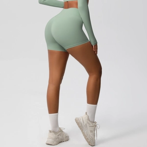 Close-up of high-waisted seamless yoga shorts showing squat-proof fabric and butt-lifting effect