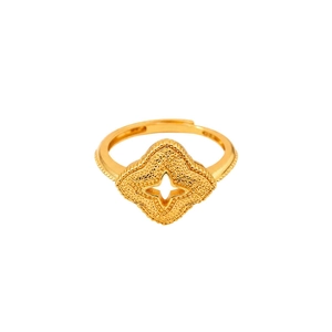 Vintage gold plated clover ring with matte embossed texture and star-shaped hollow design