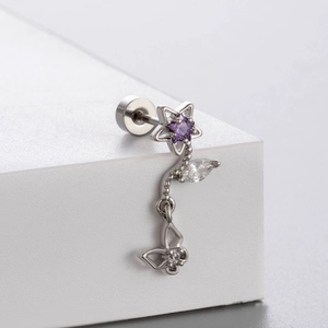 Silver butterfly ear studs with purple zircon and dangling tassels on a white background