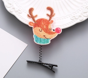 Detailansicht der Weihnachts-Rentier-Haarklammer mit Glitzerdekor und Metallfeder