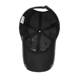 Inside view of black washed cotton baseball cap with 6-panel structure and metal buckle
