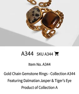 Detail of square leopard print stone and tiger eye rings with gold chain band