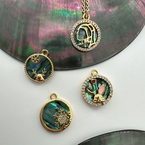 18K gold-plated shell pendants with abalone inlay and cubic zirconia snowflake motifs