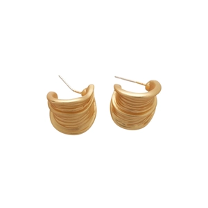 Matte gold brushed texture round stud earrings with artistic C-shaped twist design