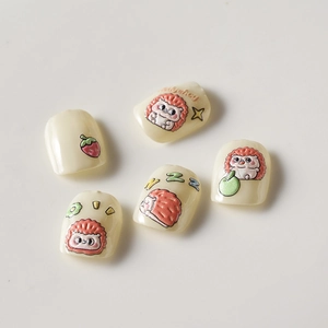 Detailed close-up of cute cartoon hedgehog nail stickers with strawberry and apple motifs