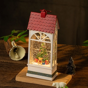 Christmas lantern music box with teddy bear and snowy tree inside a white house frame