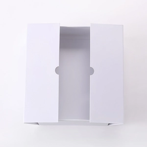 Detail view of a white foldable gift box with double doors and semi-circular cutouts