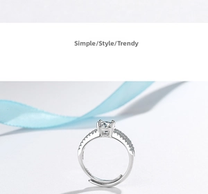 Close-up of sparkling cubic zirconia open ring with adjustable silver band for women