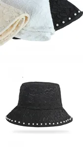 Detailed lace texture and pearl trim on women's sun hats in black, white, and beige