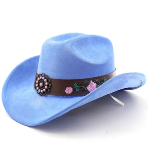 Detail of blue suede western hat featuring floral embroidery on a brown leather band