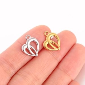 Minimalist stainless steel heart charms in gold and silver finish for DIY jewelry