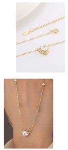 Detail of S925 silver heart necklace showing the adjustable clasp and model wearing view