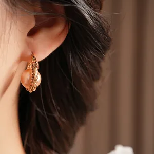 French vintage U-shaped earrings with champagne pearl and pavé brown crystals