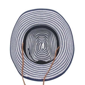 Detail of blue and white striped straw hat featuring sweatband and adjustable wind rope