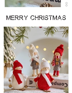 Close-up of four knitted ski-themed Santa and snowman figures for Christmas table decor