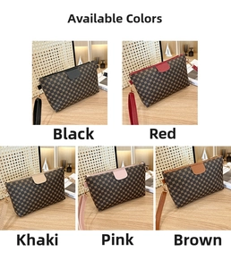 Close-up of faux leather cosmetic bags with vintage polka dot patterns and metal zippers