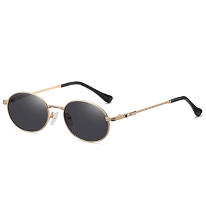 Vintage Punk Sonnenbrille mit goldenem Metallrahmen und gedrehten Bügeln