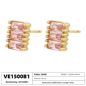 Detailed view of gold brass earrings featuring triple stacked pink rectangular stones