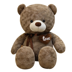 Plush light brown teddy bear with curly fur, love heart embroidery and satin bow tie