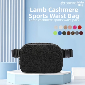 Close-up of fluffy black lamb cashmere sports waist pack with adjustable strap and buckle