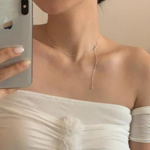 Minimalist S925 sterling silver Y-shaped chain necklace with bead charm shown on model