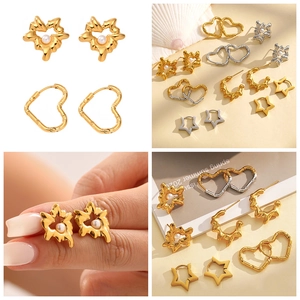 Detailed views of gold and silver heart-shaped textured hoop earrings with pearls