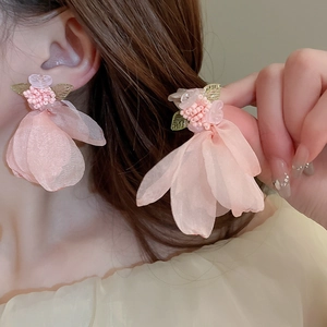 Pink lace flower beaded earrings with green leaves for a romantic vacation style